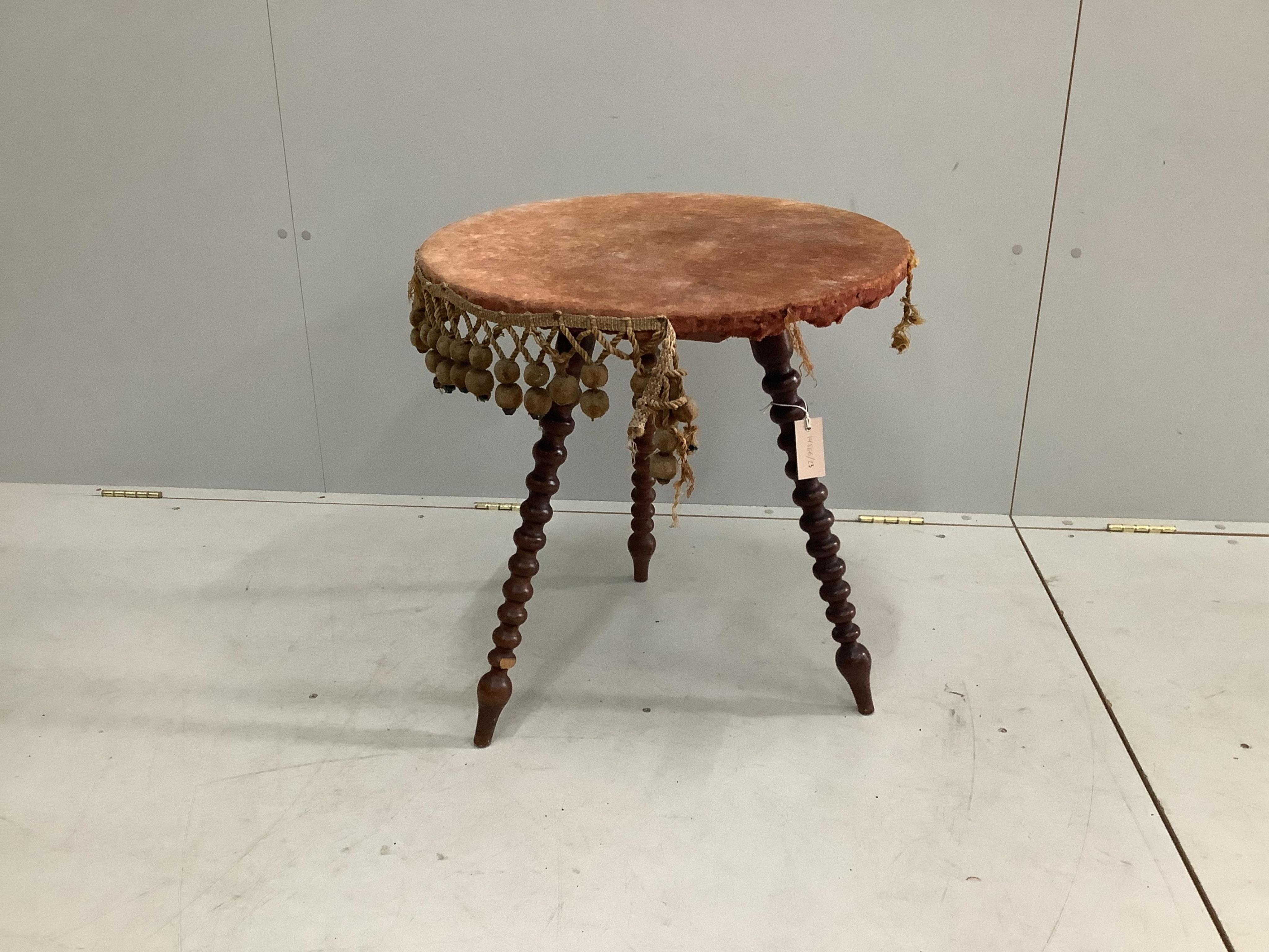 A Victorian circular gypsy table, diameter 56cm, height 59cm. Condition - fair
